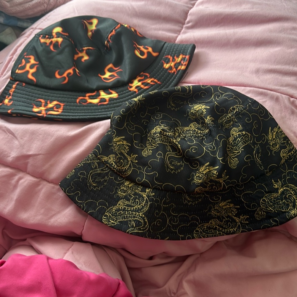 2 pack bucket hats, dragon print and fire print
